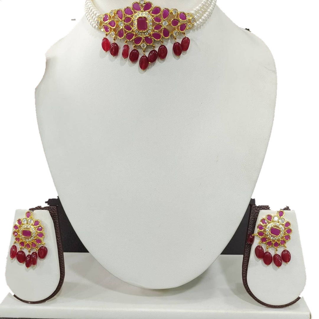 Elegant choker set featuring intricate designs with pearls and sparkling accents.