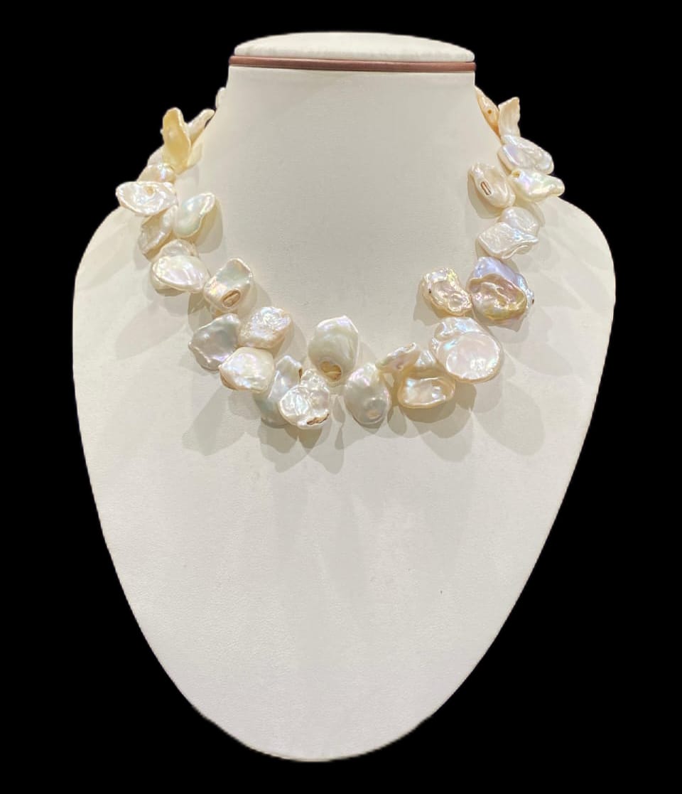Elegant Mother of Pearl with Natural Shape, showcasing its unique and organic beauty.