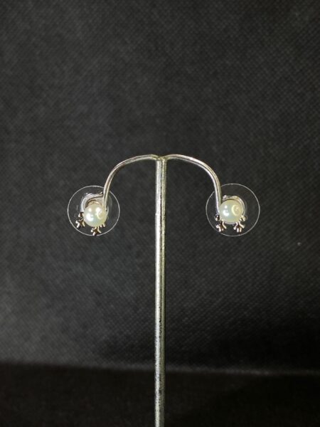 Classic Pearl Studs with a simple and timeless design.
