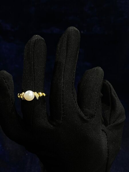 Pearl Cascade Ring with an elegant cascading design of luminous pearls.