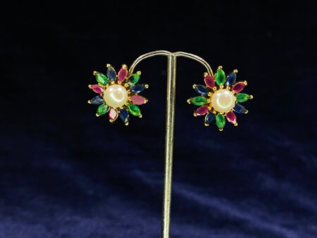 Pearl and Gemstone Starburst Tops featuring a stunning mix of pearls and gemstones.