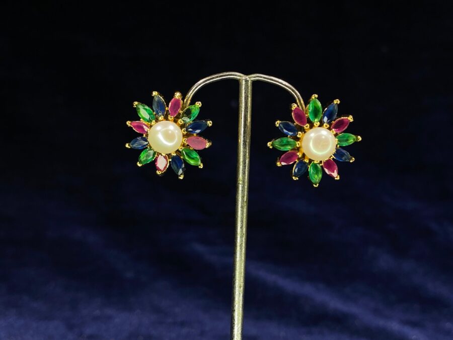 Pearl and Gemstone Starburst Tops featuring a stunning mix of pearls and gemstones.