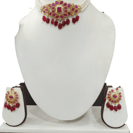 Elegant choker set featuring intricate designs with pearls and sparkling accents.