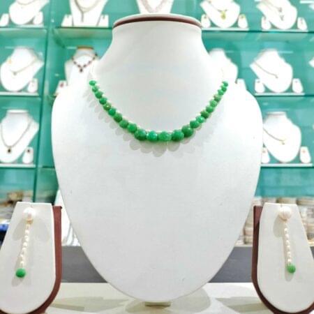 Elegant One Line Rice Pearls Set with Stone accents for a delicate and timeless look, perfect for any occasion.