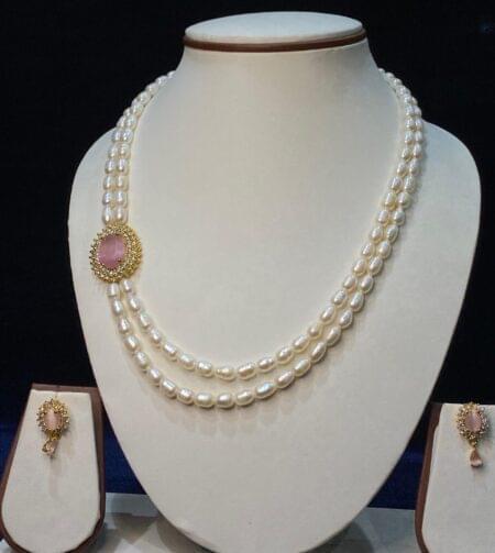 Elegant two-line side pendant pearls set, featuring a refined pendant design that adds sophistication and charm to your jewelry collection.