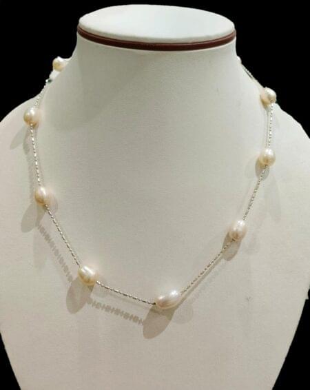 Stylish Ball Chain with Nine Pearls, offering a sleek and modern design with the perfect touch of elegance.