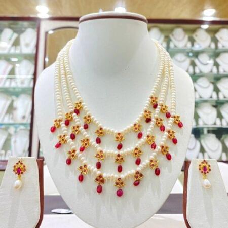 Elegant fancy three-line pearls set featuring lustrous pearls in a layered design for a timeless and sophisticated look.