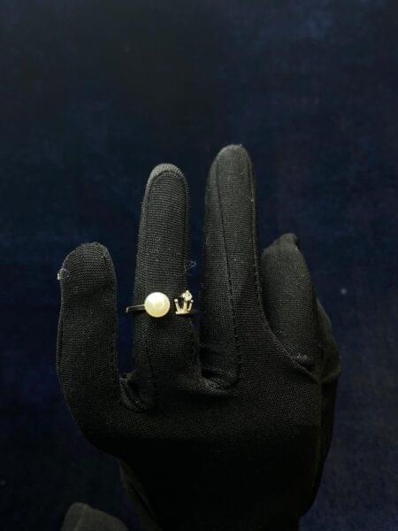 Royal Pearl Ring with a majestic pearl centerpiece and regal design.