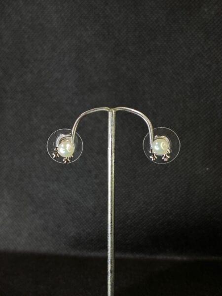 Classic Pearl Studs with a simple and timeless design.