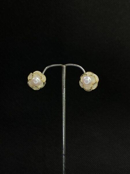 Floral Pearl Studs with a delicate flower design and central pearl.