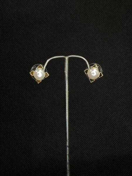 Pearl Wing Earrings with a graceful wing design and a lustrous pearl accent.