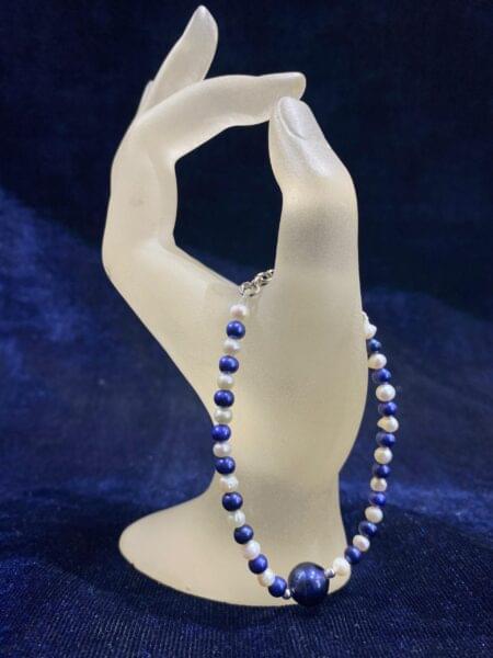 Sapphire and Pearl Harmony Bracelet featuring luminous pearls and sparkling sapphires.