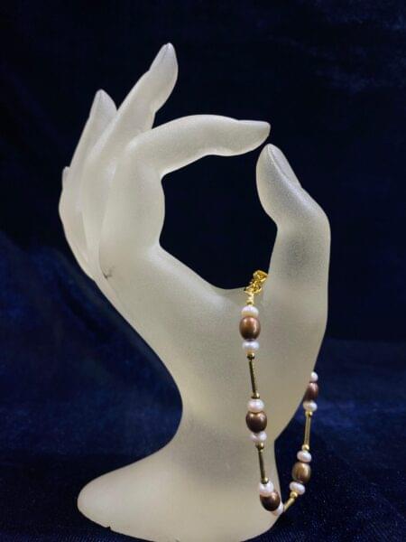 Pearl Duet Bracelet featuring twin pearls and an elegant minimalist design.