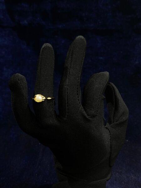 Classic Pearl Ring with a luminous single pearl centerpiece.