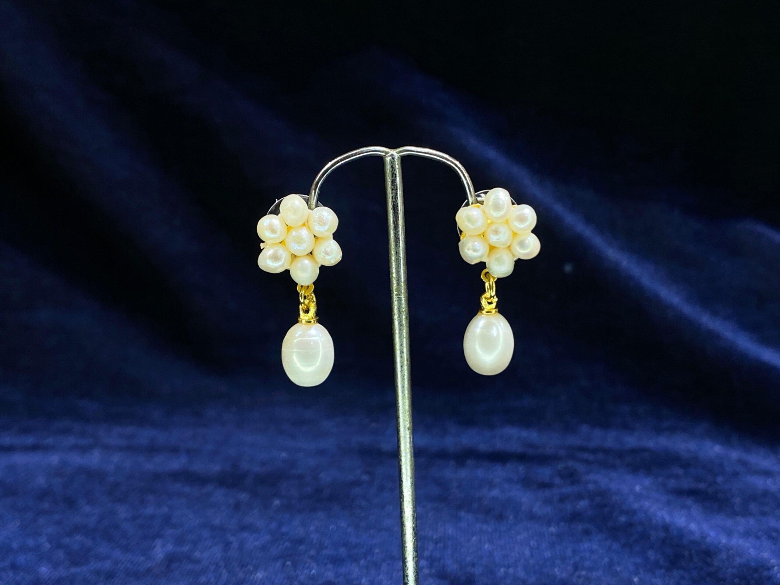 Pearl Flower Drop Earrings with an elegant floral design for versatile styling.