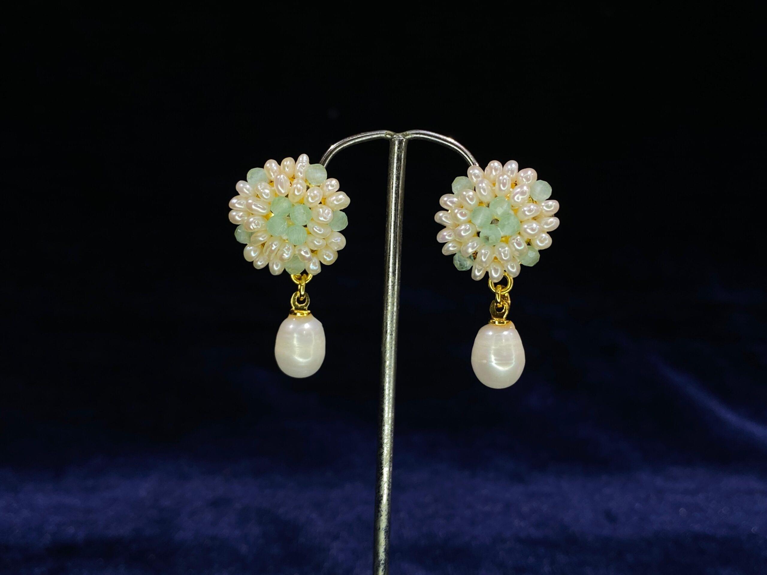 Pearl and Crystal Flower Drop Earrings with a sparkling floral design for elegant occasions.