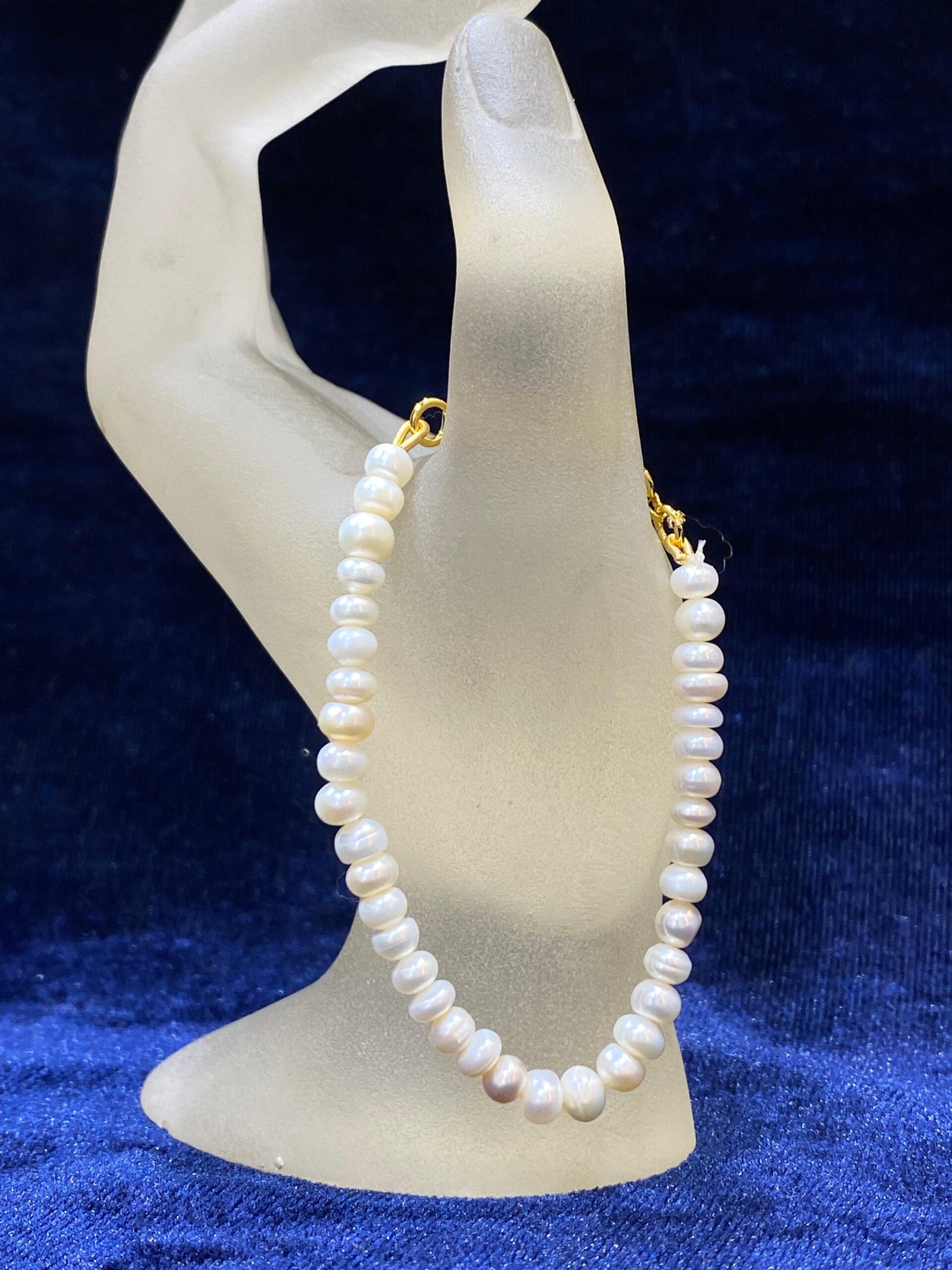Classic Pearl Bracelet showcasing timeless elegance with luminous pearls.